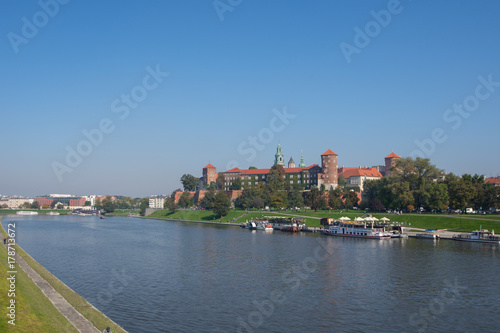 Krakow, Poland 01/10/2017 People walking by the Vistula River with a Panoramic View © Mauro WildRover