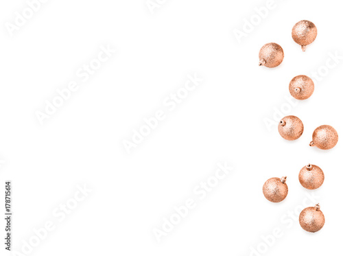 Wallpaper Mural Golden Christmas balls are arranged on a white background. A festive background in a minimalistic style for Christmas or New Year's greetings, advertising, sales, discounts. Torontodigital.ca