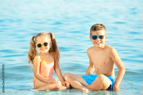 Cute little children on sea...