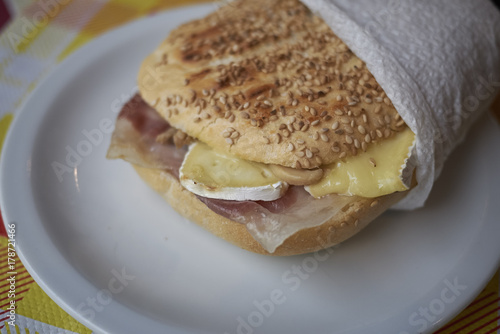 Sandwich with ham and brie photo