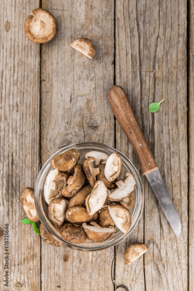 Fototapeta premium Portion of Raw Shiitake mushrooms, selective focus