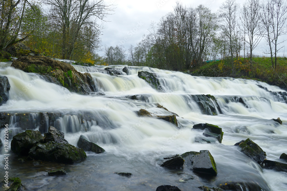 Fototapeta premium Stepping Stones Over a River.