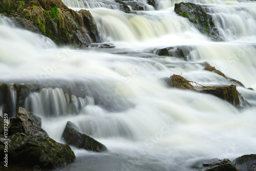 Fototapeta Naklejka Na Ścianę i Meble -  River flowing over boulders.