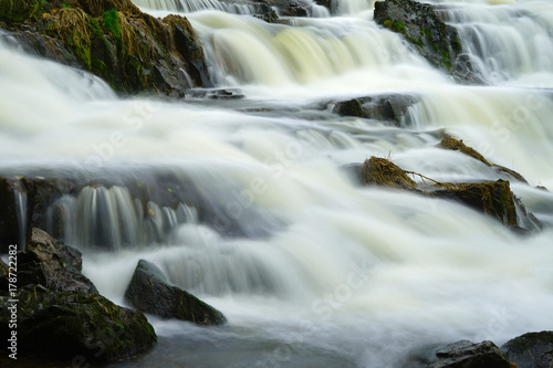 River flowing over boulders.