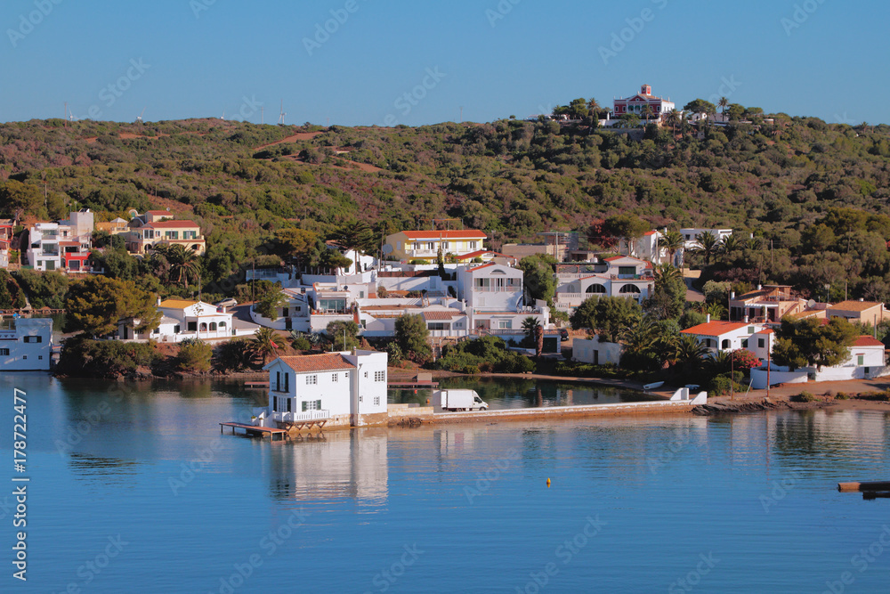 Houses on coast of sea gulf.  Mahon, Minorca, Spain