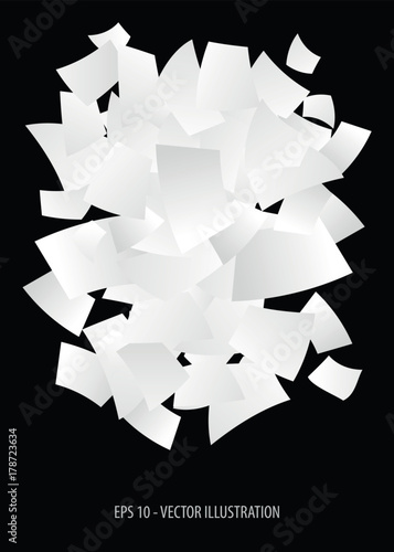 White paper sheets flying on black background