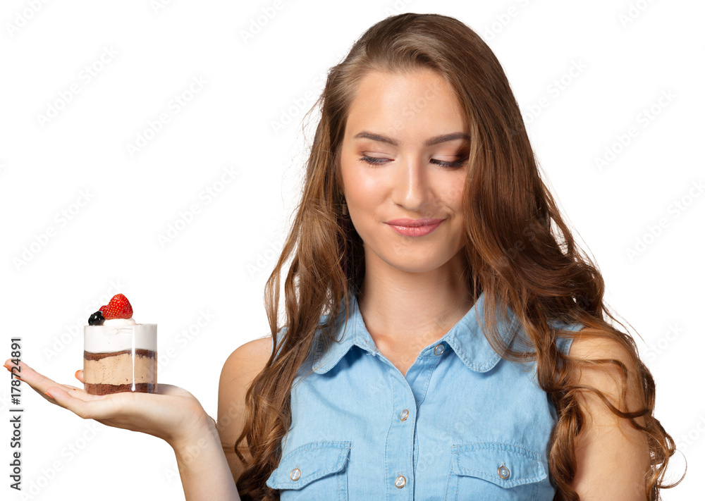 Cute attractive young woman standing and holding cup dessert Cute attractive young woman standing and holding cup dessert