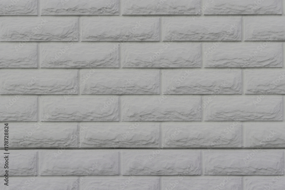 Fototapeta premium White decorative brick wall as a background, texture
