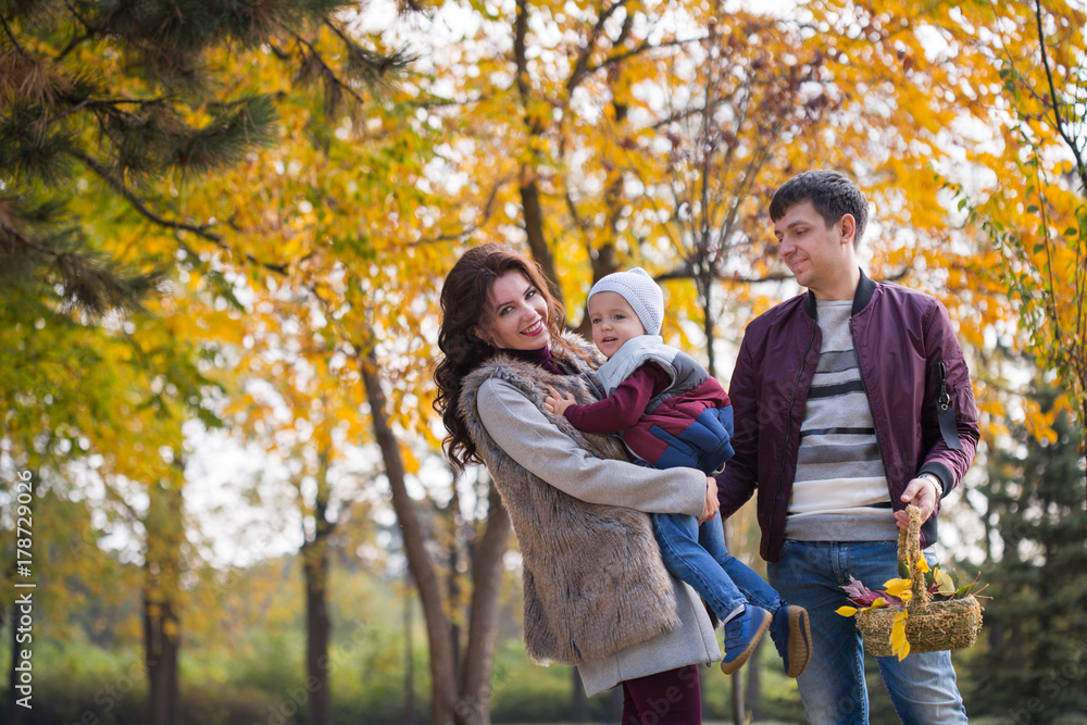 family walks in the autumn park family walks in the autumn park
