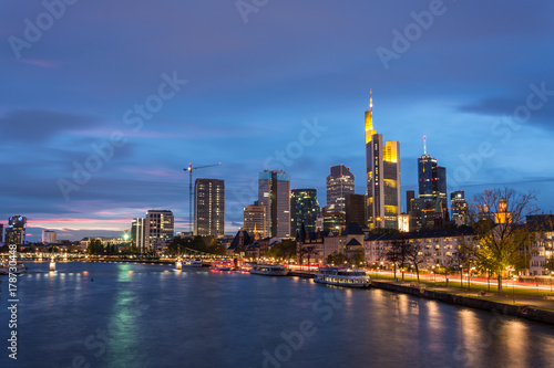 The skyline of Frankfurt with the river Main during blue hour