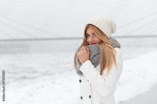 Winter portrait of beautiful blonde young woman