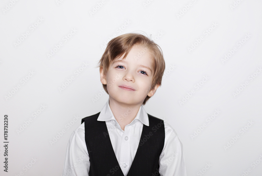 Portrait of laughing beautiful blond child. Close up of cheerful funny small boy isolated on white background. Portrait of laughing beautiful blond child. Close up of cheerful funny small boy isolated on white background.