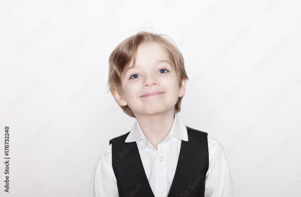 Portrait of laughing beautiful blond child. Close up of cheerful funny small boy isolated on white background. Portrait of laughing beautiful blond child. Close up of cheerful funny small boy isolated on white background.