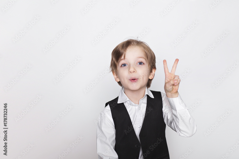 Portrait of laughing beautiful blond child. Close up of cheerful funny small boy isolated on white background. Portrait of laughing beautiful blond child. Close up of cheerful funny small boy isolated on white background.