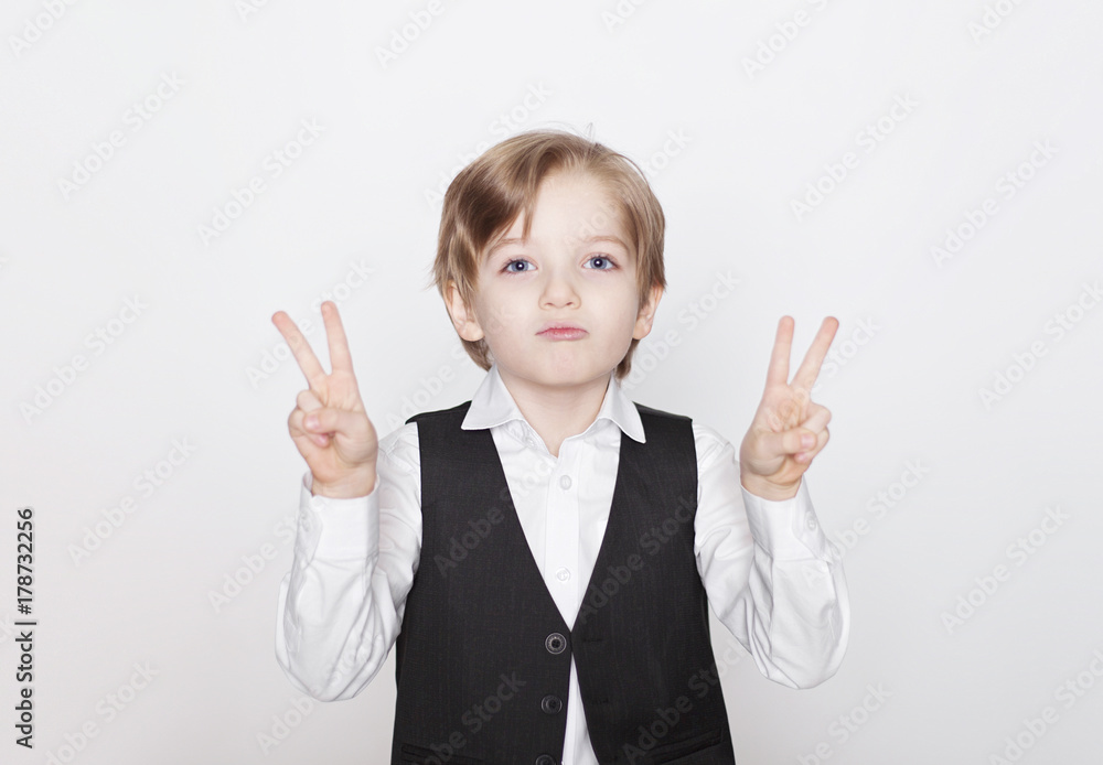 Portrait of laughing beautiful blond child. Close up of cheerful funny small boy isolated on white background. Portrait of laughing beautiful blond child. Close up of cheerful funny small boy isolated on white background.