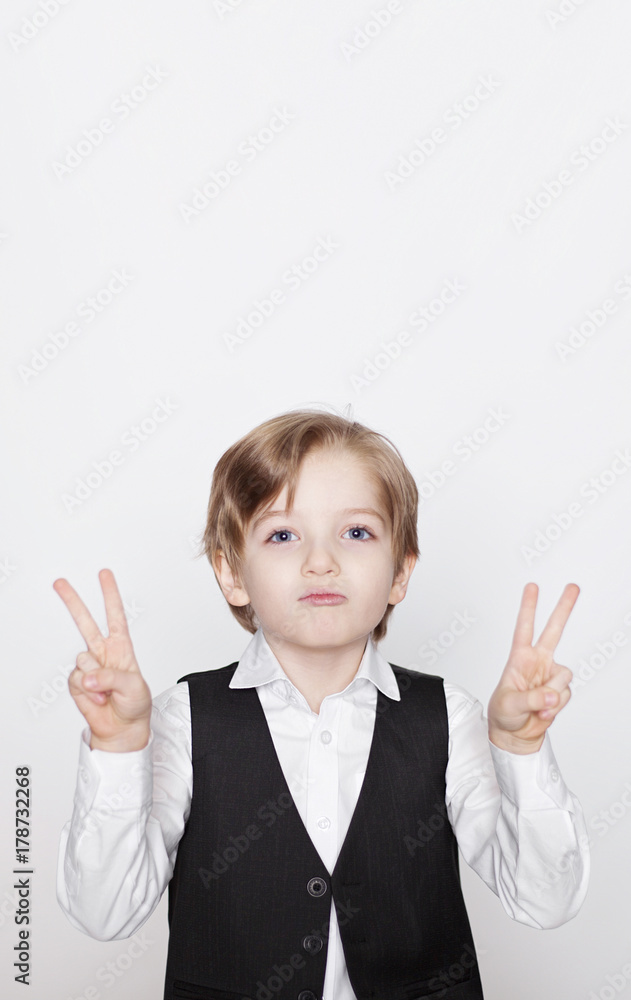 Portrait of laughing beautiful blond child. Close up of cheerful funny small boy isolated on white background. Portrait of laughing beautiful blond child. Close up of cheerful funny small boy isolated on white background.