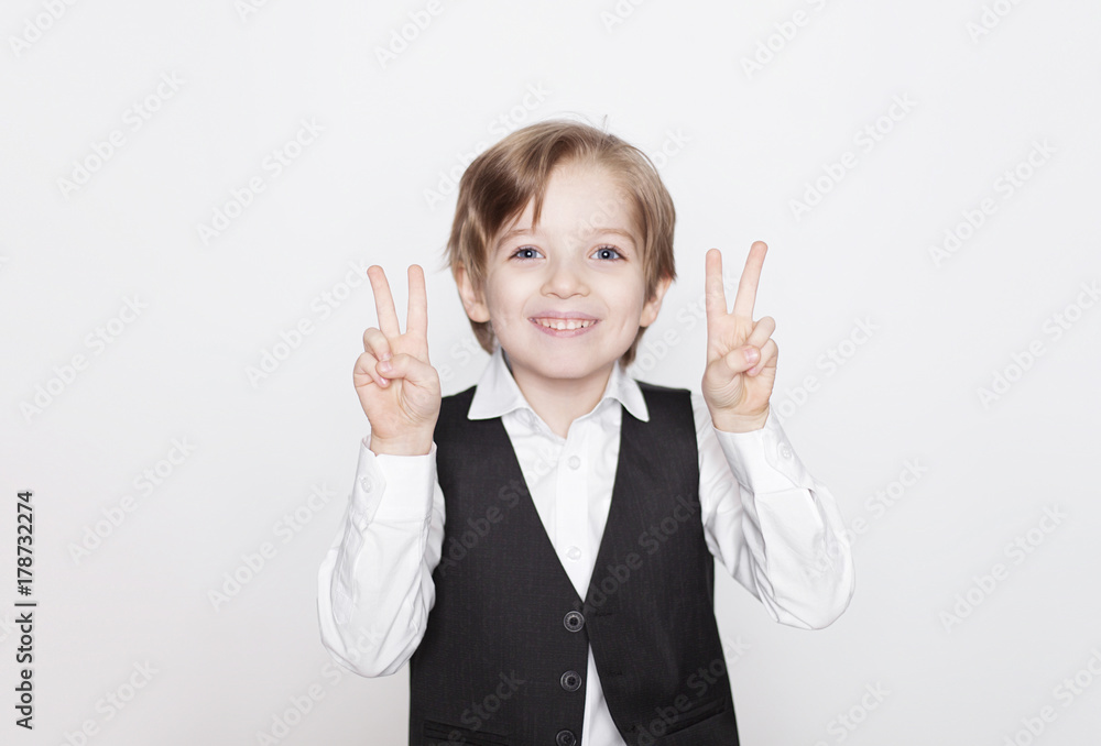Portrait of laughing beautiful blond child. Close up of cheerful funny small boy isolated on white background. Portrait of laughing beautiful blond child. Close up of cheerful funny small boy isolated on white background.