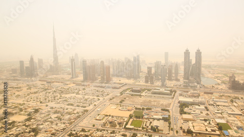 Aerial view of the business district of Dubai. Shooting in the summer haze of heat. August 2014. UAE.