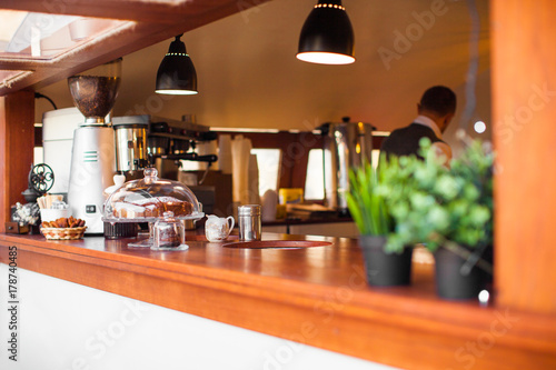 A beautiful bar with a coffee bar and a dessert