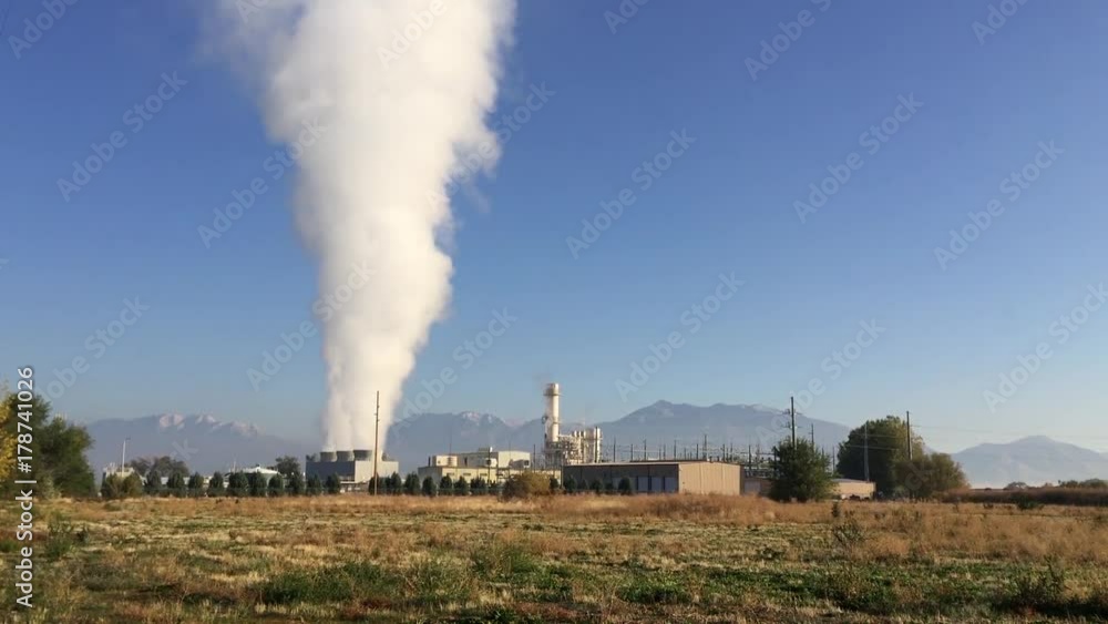 Smoke stacks send pollution into the air Smoke stacks send pollution into the air