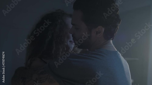 Couple having a quarrel. Woman is crying while man is scolding in the background, love and tears, student young love with emotions