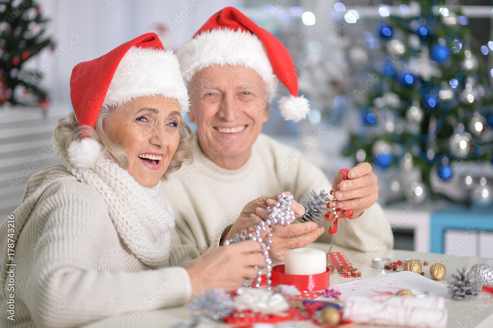 Senior couple preparing for Christmas Senior couple preparing for Christmas