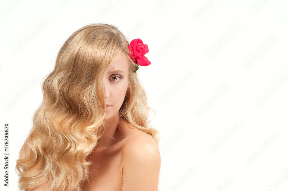 Naklejka premium Portrait of blond woman with long healthy hair. Beauty and spa, girl with perfect skin.