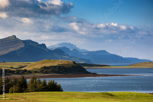 Beatiful and serene landscape of a lake and mountains in the Isle of Skye in Scotland, United Kingdom; Concept for travel in Scotland