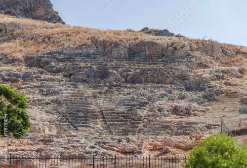 Ancient archaeological architecture Greek amphitheater in city Lindos, Rhodes photo