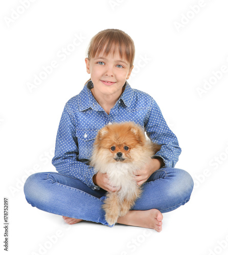 Cute girl with little dog o...