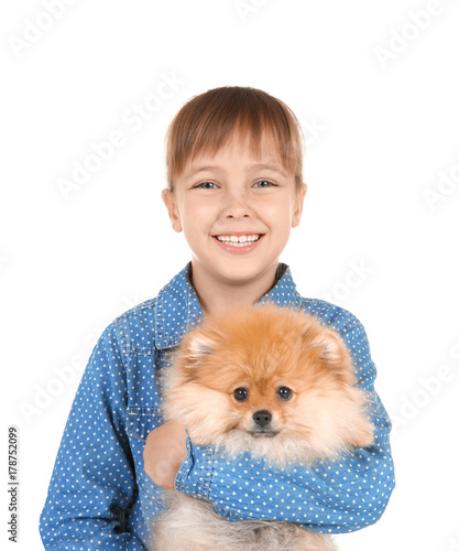 Cute girl with little dog o...