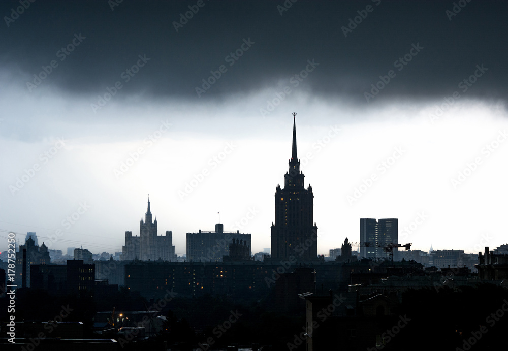 Naklejka premium Stalin skyscrapers in Moscow in the storm