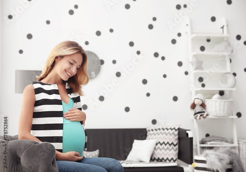 Beautiful pregnant woman in...
