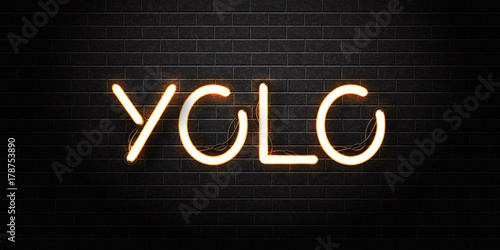 Vector realistic isolated neon sign of Yolo lettering for decoration and covering on the wall background. Concept of motivation and craziness. photo