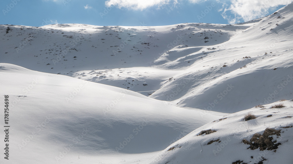 Reflective snowy backgrounds, dunes and hills