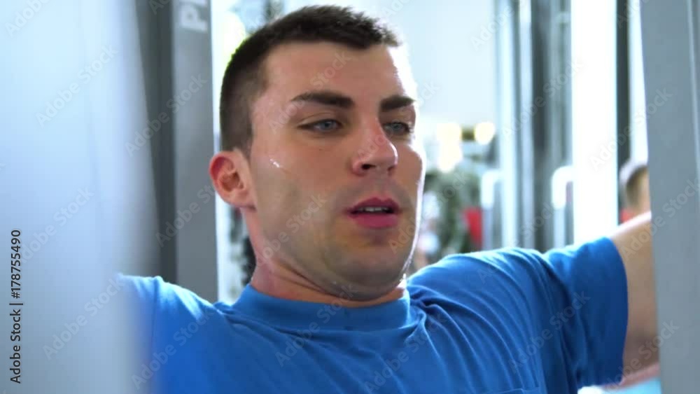 Handsome young man doing sports in the gym. Handsome young man doing sports in the gym.