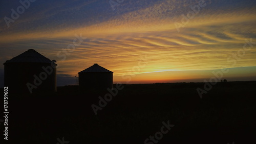 Sunset over a farm in the counryside