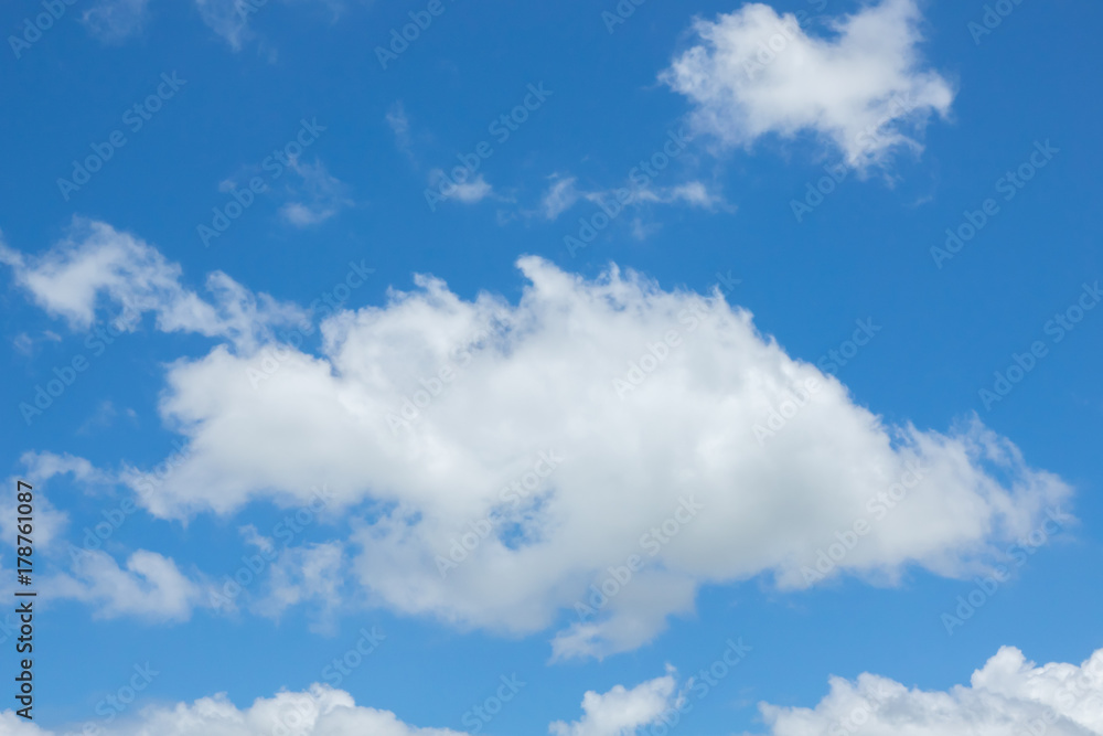 Blue sky with clouds. Daylight blue sky background Blue sky with clouds. Daylight blue sky background