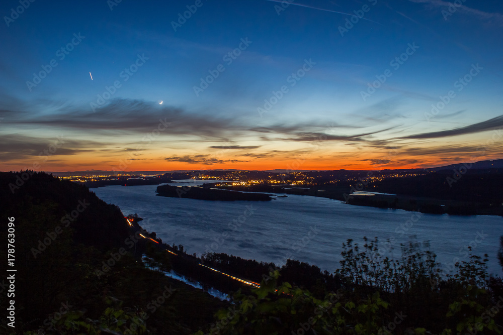 Portland and a glowing Columbia River at sunset