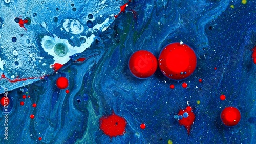 Bright Vibrant Swirling Colors - red balls spheres on blue and white