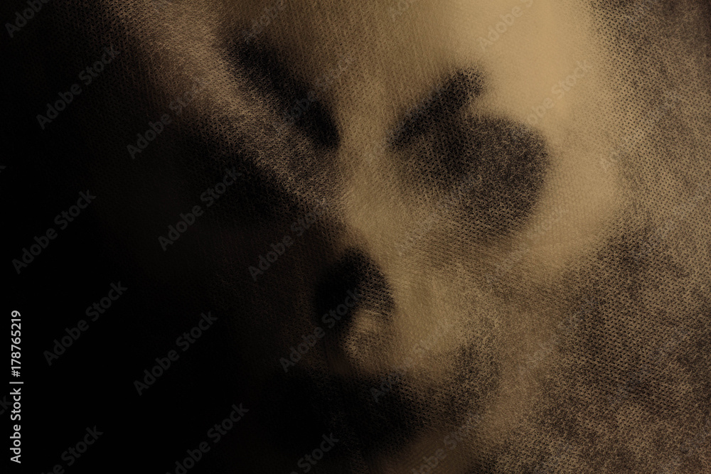 Fototapeta premium Ghost mask in the dark.