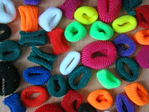 Wallpaper Mural Colored hair bands on a brown background Torontodigital.ca