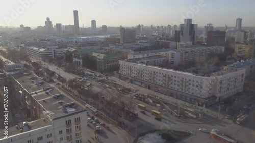 Top view aerial photo from flying drone of a Global City with development buildings, transportation, energy power infrastructure. Financial and business centers in developed town photo