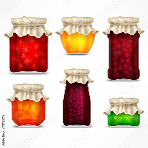 Natural fruit jam preserves jars with strawberry, cherry.