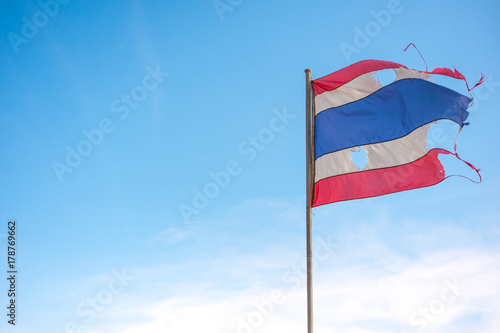 thailand torn flag with blue sky and wind Free Download thailand torn flag with blue sky and wind - GFXLoad