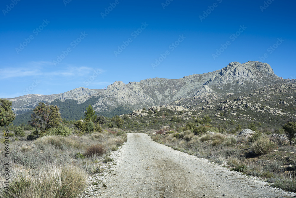 Views of Guadarrama Mountains (Madrid, Spain) with La Bola del Mundo peak, La Barranca Valley and La Maliciosa peak in the background