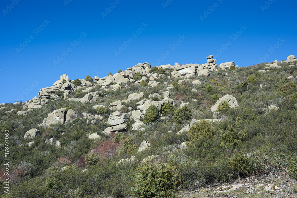 Granite formations in Guadarrama Mountains (Madrid, Spain) near the La Maliciosa Reservoir.