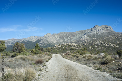 Views of Guadarrama Mountains (Madrid, Spain) with La Bola del Mundo peak, La Barranca Valley and La Maliciosa peak in the background
