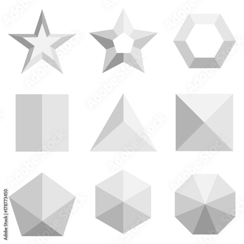 A set of three-dimensional geometric shapes in gray. Top view on geometric shapes
