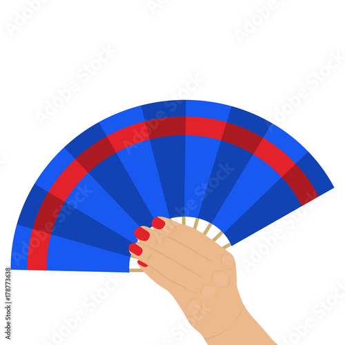 Fan in a female hand, waving a fan.